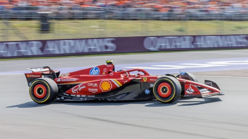 Ferrari F1 car going through a corner