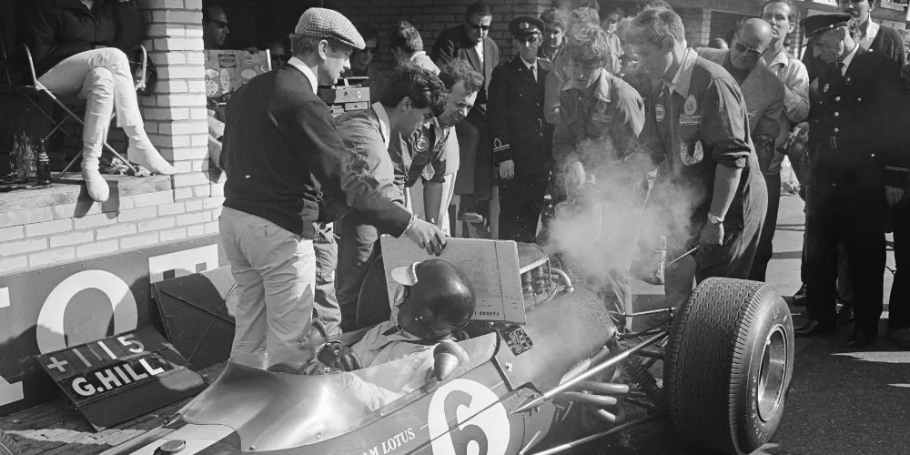 Colin Chapman overseeing a pit stop of Jim Clark, 1966