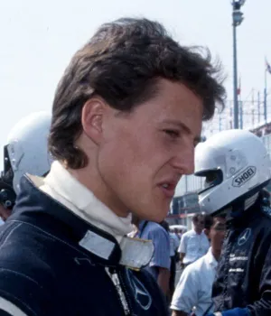 Michael Schumacher, seven-time F1 champion, driving for Benetton and Ferrari during his record-breaking career.