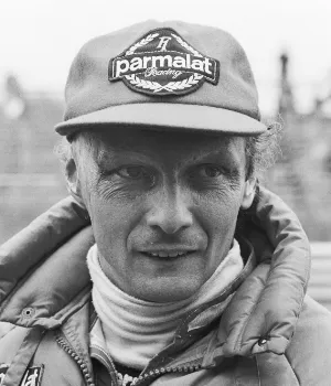 Niki Lauda, three-time F1 World Champion, known for his triumphs with Ferrari and McLaren.