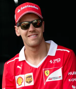 Sebastian Vettel, four-time F1 champion, dominating with Red Bull from 2010 to 2013.