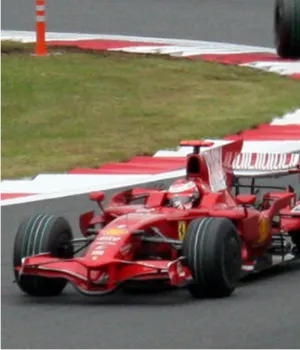 ferrari f1 car driving on track