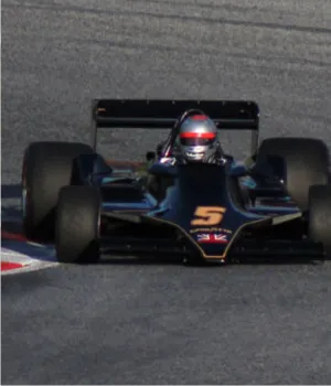 lotus f1 car driving on track