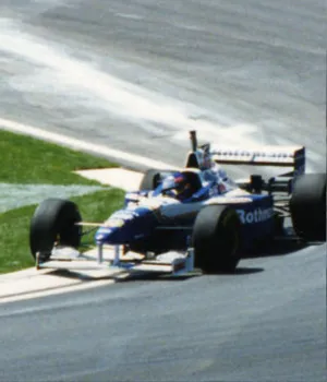 williams f1 car driving on track